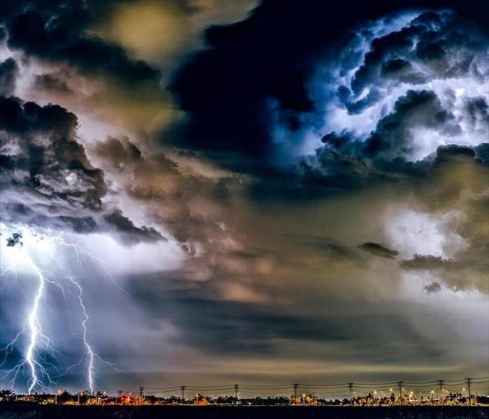 Thunder in the sky over a city